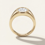MOHSTEN Tova yellow gold signet ring with horizontal oval cut diamond.