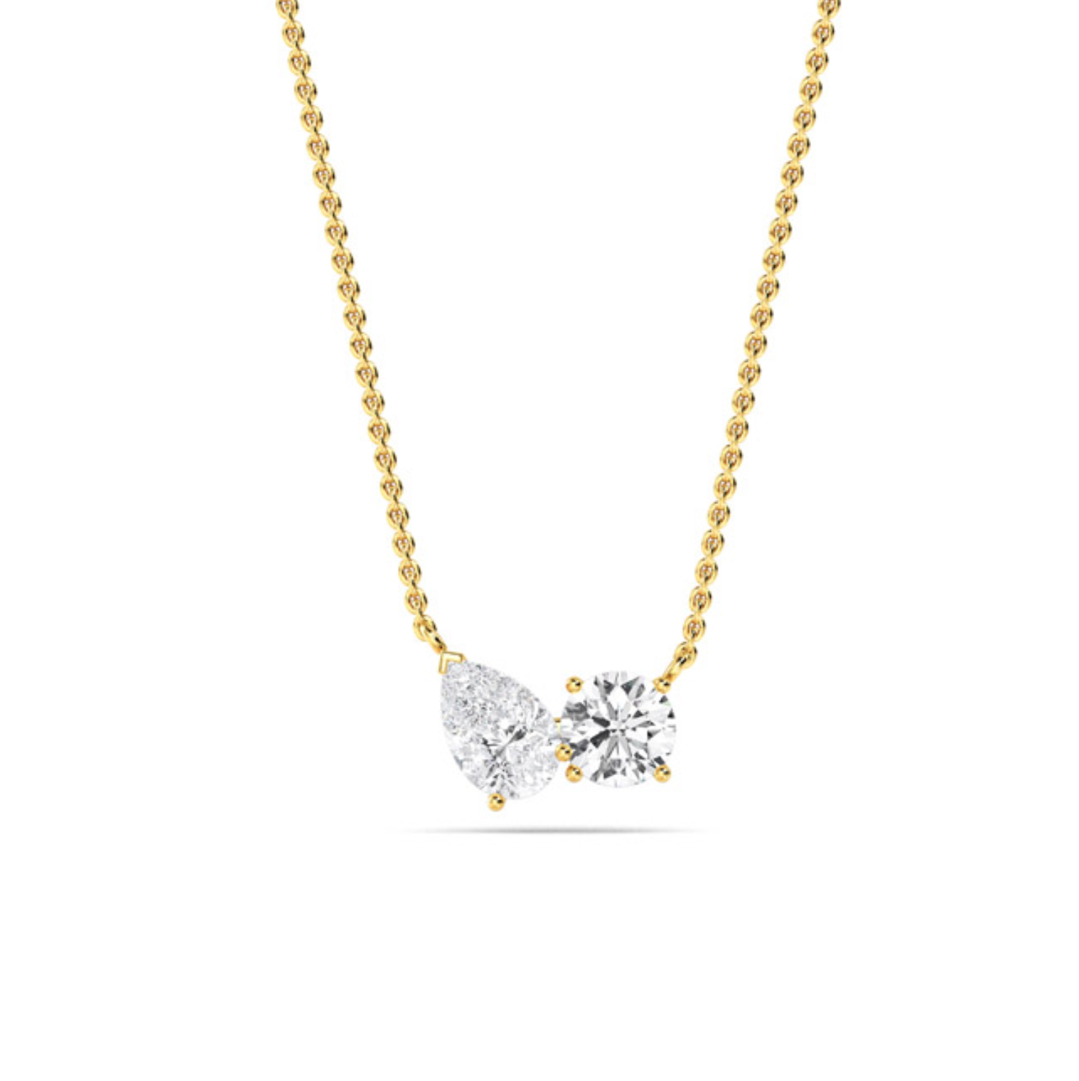 Diamond Duo Necklace featuring claw-set pear and round lab-grown diamonds spaced on a fine 18 ct gold chain, shown on white background