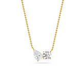 Diamond Duo Necklace featuring claw-set pear and round lab-grown diamonds spaced on a fine 18 ct gold chain, shown on white background