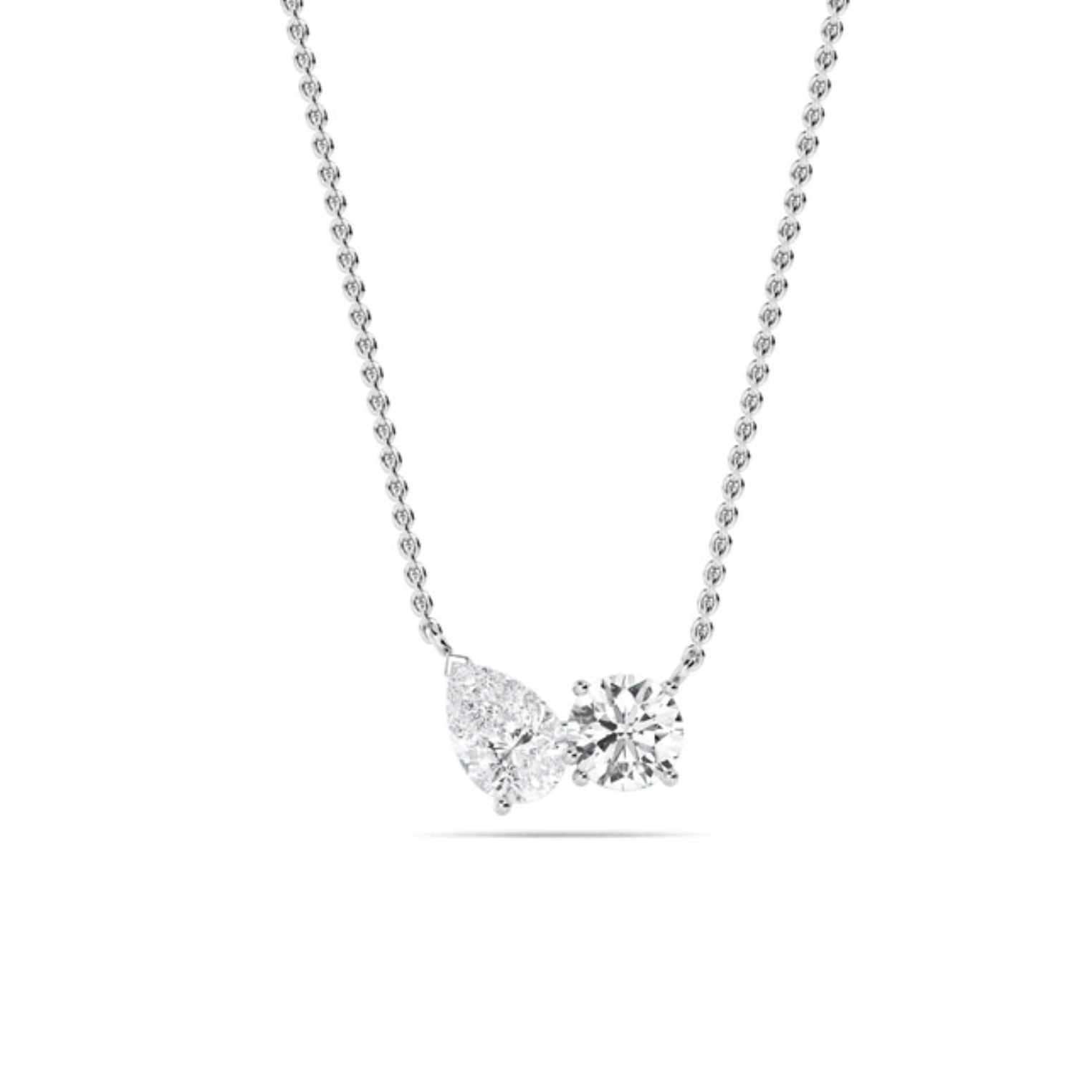 Diamond Duo Necklace featuring claw-set pear and round lab-grown diamonds spaced on a fine 18 ct white gold chain, 