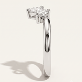 white gold wishbone pear diamond wedding ring side view