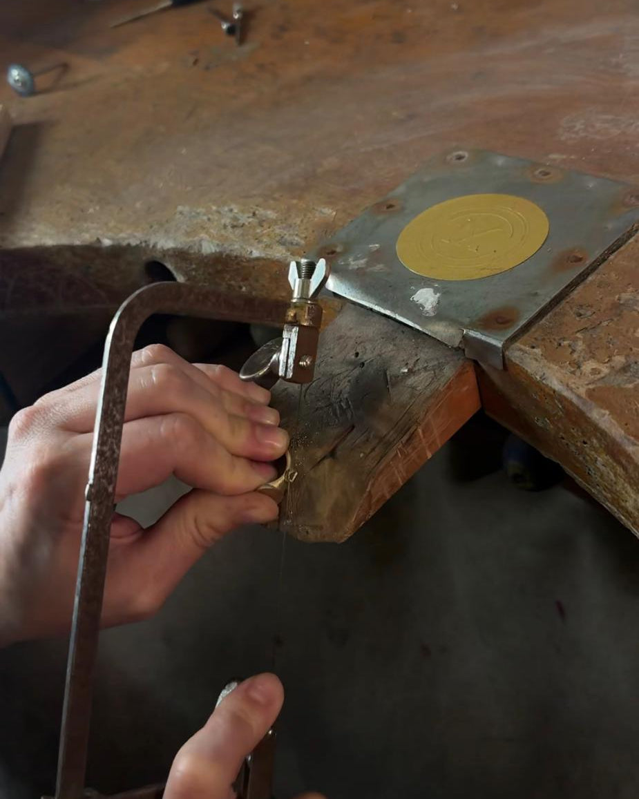Jess in the workshop making a ring.  Craftmanship guide by MOHSTEN